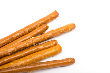 Closeup macro of baked grissini with copy space over white background