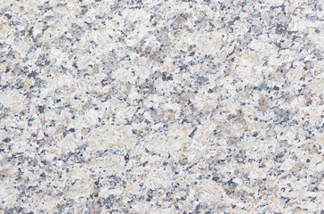 Real granite stone texture in top view. Natural material with gray abstract texture pattern of mineral, quartz. Smooth surface for decorative wall, floor, countertop, slab in bathroom and kitchen.