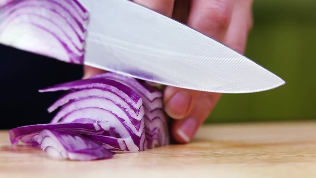 cutting onions with knife