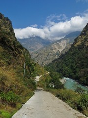 Road from Besi Sahar to Manang. Marsyangdi River. Autumn scene near Jagat, Annapurna Conservation Area, Nepal.