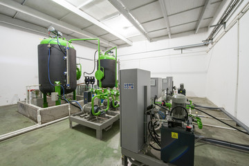 workshop with containers and tanks for the production of polyurethane. polyurethane technology