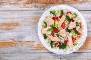 fried vegetables and boiled chicken breast