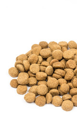 Dog and cat food granules isolated over white background