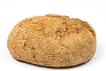 Round domestic bread isolated over white background