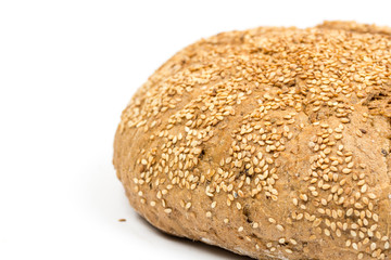 Round domestic bread isolated over white background