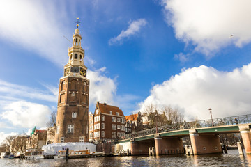 Fototapeta na wymiar Amsterdam canals, bridges and houses