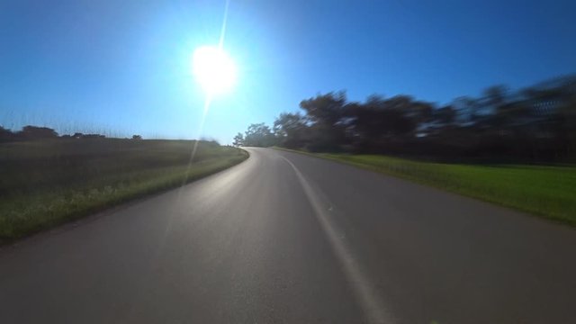 Driving a car on a country road. With motion blur