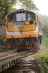 Obraz premium Moving train at death railway, Kanchanaburi, Thailand