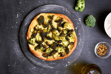 Pizza with broccoli and cheese