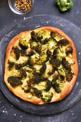 Pizza with broccoli and cheese