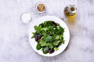 Green salad with leaves of spinach, arugul