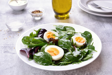 Salad with eggs and greens