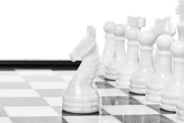 White chessmen on chessboard