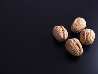 Walnuts isolated on black background