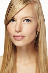 Naklejka premium Blond and beautiful woman in studio, close up