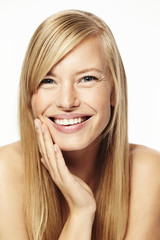 Blond and beautiful woman smiling, portrait