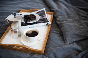 Coffee and breakfast in bed, cozy morning 