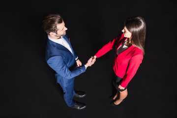 Man and woman shaking hands