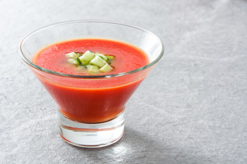 Traditional Spanish cold gazpacho soup on gray stone
