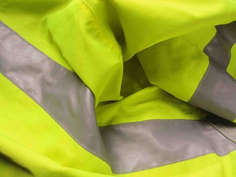 High Visibility Yellow Jacket As Background