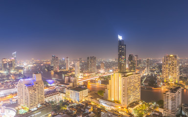 Fototapeta premium Aerial view cityscape and Chaophraya river in Bangkok, Thailand.