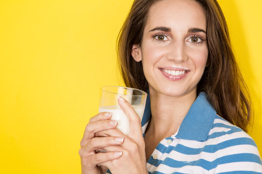 young woman drink milk