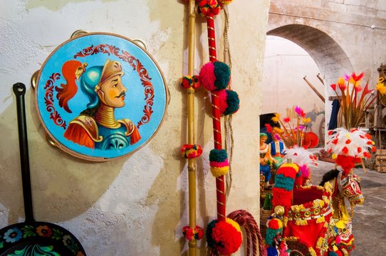 Decorated tambourine inside the workshop of sicilian folkloric craftsmanship Rosso Cinabro in Ragusa Ibla, Sicily