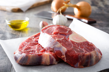 Raw meat on wooden background

