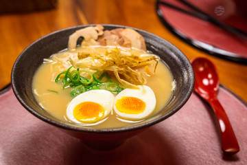 Japanese ramen soup with eggs in the bowl