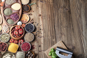 Fototapeta na wymiar various dry spices on a wooden table