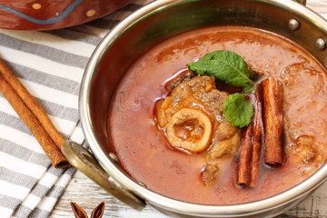 Rogan Josh / Kashmiri Lamb curry served in a Kadai, selective focus