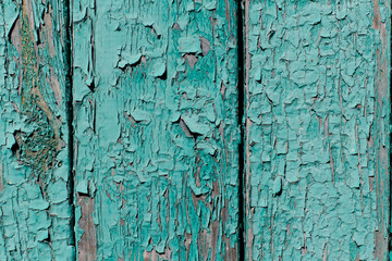 Old wood background with peeling paint. Vintage wood texture.