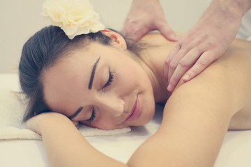 Woman enjoying a massage treatment.