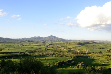Green landscape of Stavrovouni mountain and cloudy sky