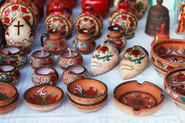 Fototapeta na wymiar Armenian ancient style pottery clay cup in the market Vernisazh