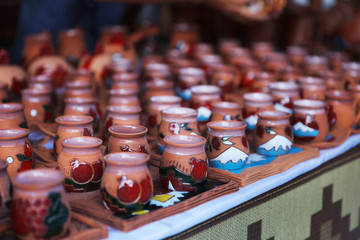 Armenian ancient style pottery clay cup in the market Vernisazh