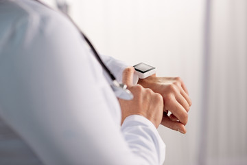 Doctor using smartwatch