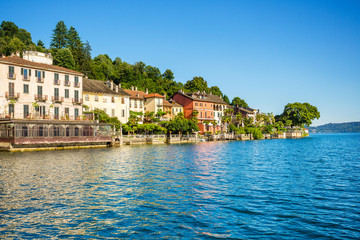 Fototapeta na wymiar View of Motta square in Orta San Giulio from a Taxi boat, Lake Orta, Piedmont, Italy