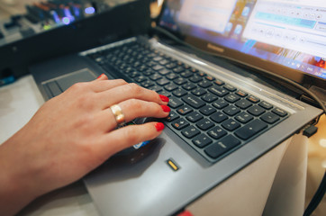 Fototapeta na wymiar Woman working on laptop at home