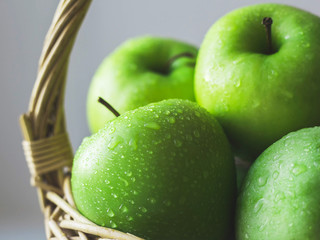 green apples in a basket