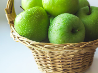 green apples in a basket