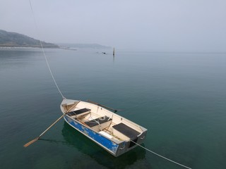 boat in foggy sea