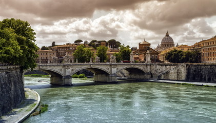 Obraz premium Tiber river, Ponte Sant'Angelo and St. Peter's cathedral, Roma, Italy