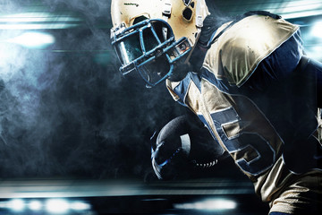 American football sportsman player on stadium running in action