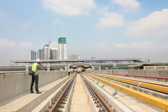 Engineer take a photo track and station of sky train