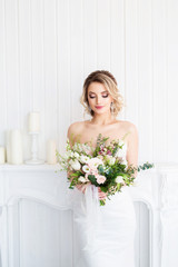 Beautiful bride with a wedding bouquet