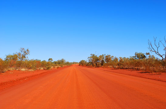 Red center, road outback in Australia.