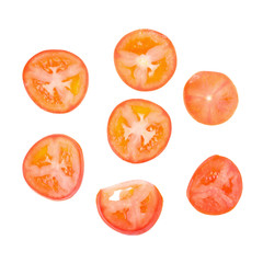 Slices of tomatoes. Chopped tomatoes. Tomatoes cut into slices. on a white background