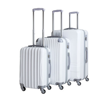 Three suitcases isolated on white background. Polycarbonate suitcases isolated on white. Green suitcases.