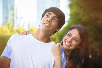 Obraz premium portrait of happy Hispanic couple in the park